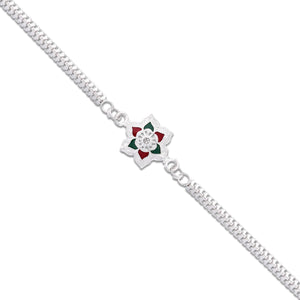 Silver plated rakhi bracelet with floral design and red green accents from Superior eMart