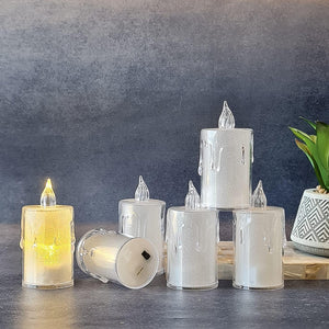 Set of simple candles for home with flickering LED lights for a cozy atmosphere
