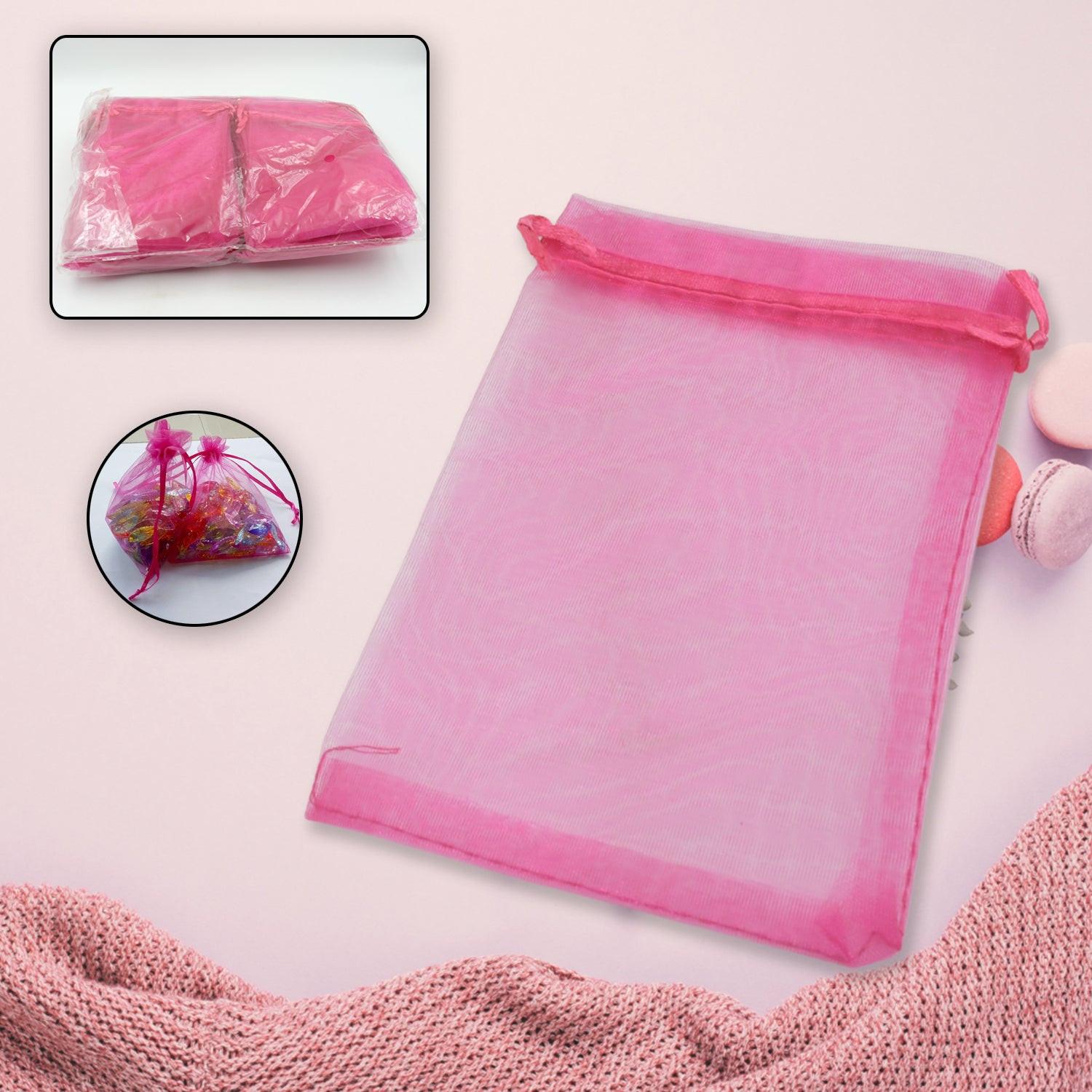 Small organza gift bags in vibrant pink, perfect for party favors and special occasions
