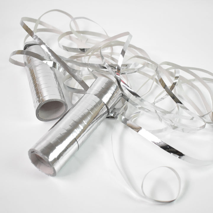 Smooth ribbon for decorations in silver rolls with decorative curls for crafting and party use