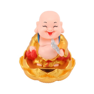 Vibrant solar powered Buddha statue seated on a lotus flower base, perfect for home decor