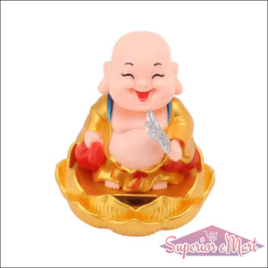 Solar powered Buddha statue with a smiling face and vibrant golden robe for home decor
