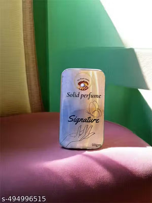 Solid fruit perfume for men and women in a compact 10gm tin with elegant packaging