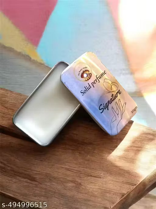 Open tin of Superior eMart solid fruit perfume for men and women on a wooden surface