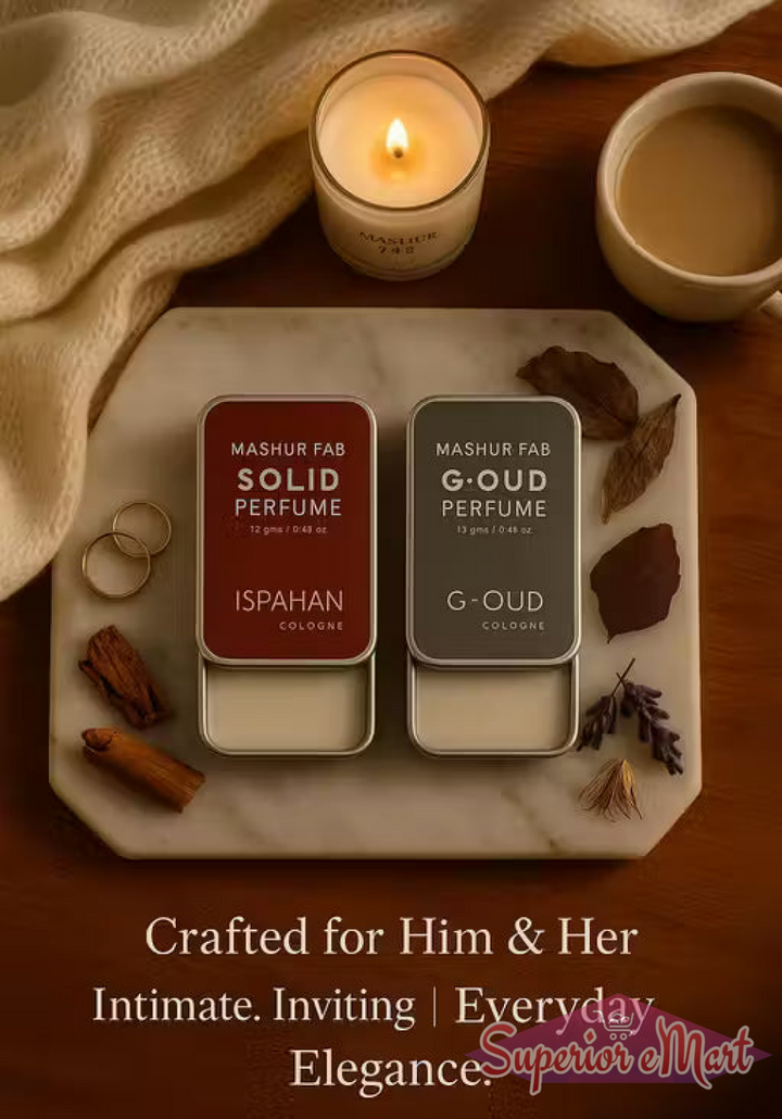 Mashur Fab maroon and grey solid perfume tins on a marble tray with a candle, coffee, and "Everyday Elegance" text.