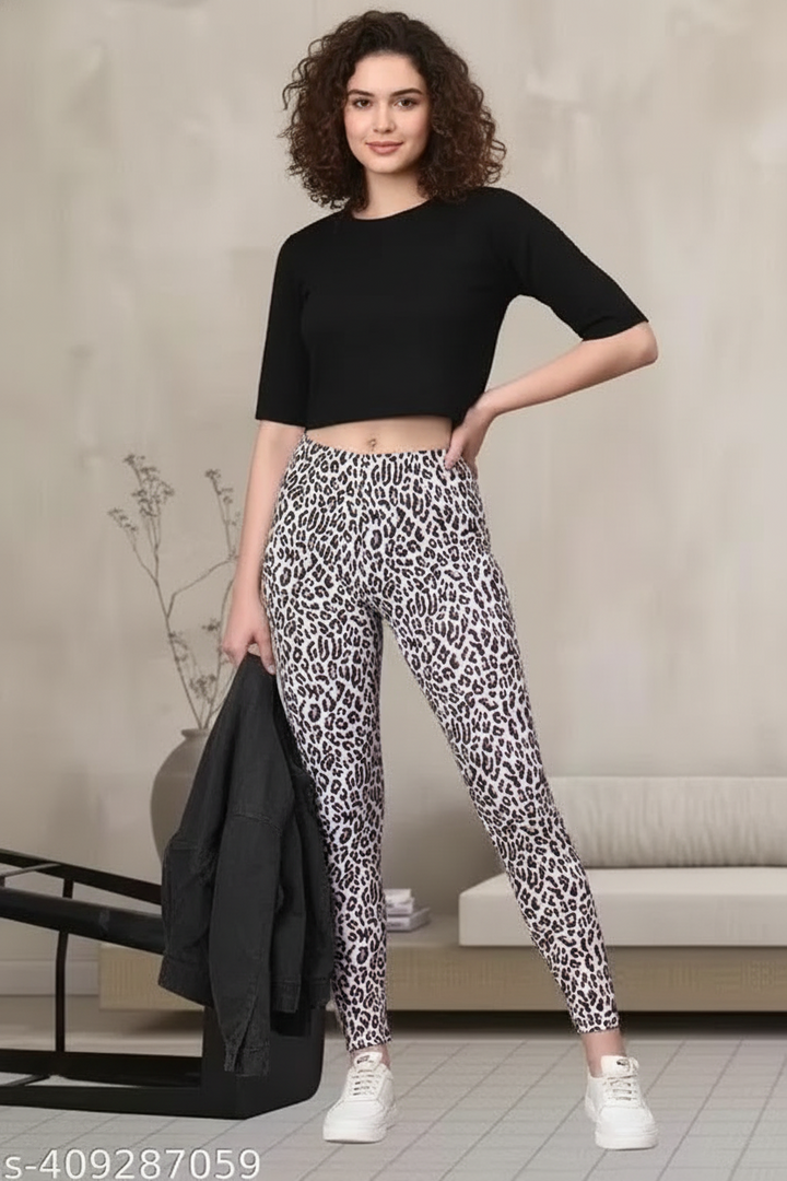 Stylish girls in black crop top wearing solid multicolor jeggings for women with leopard print design