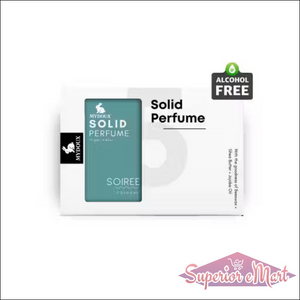 Mydoux Solid Perfume Soiree in white and teal packaging. Alcohol-free with beeswax, shea butter, and jojoba oil.