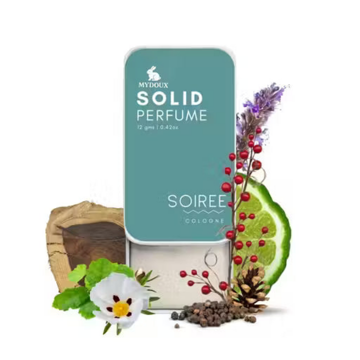 Mydoux Soiree Solid Perfume in a teal sliding tin, featuring notes of lavender, lime, red berries, and wood. 12g.