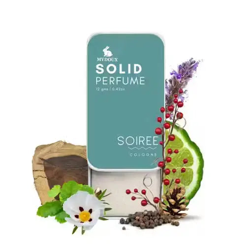 Mydoux Soiree Solid Perfume in a teal sliding tin, featuring notes of lavender, lime, red berries, and wood. 12g.