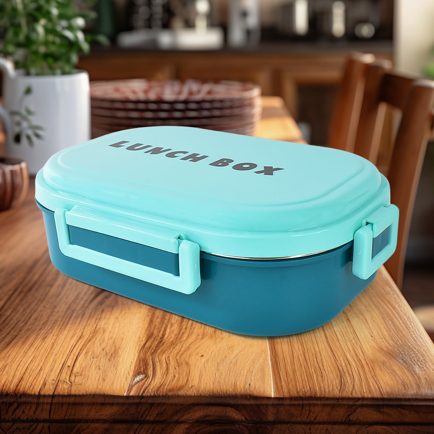 3 in 1 lunch box with spoon by Superior eMart in teal and blue on wooden table