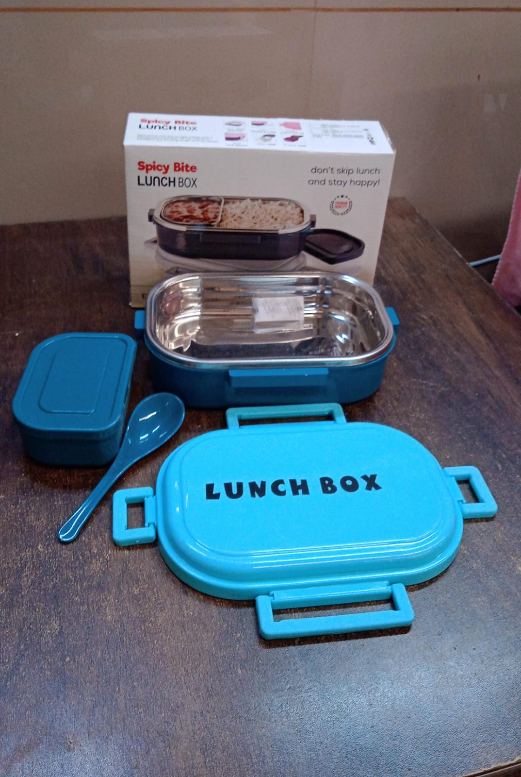 Superior eMart 3 in 1 lunch box with spoon featuring multiple compartments and a blue carrying case