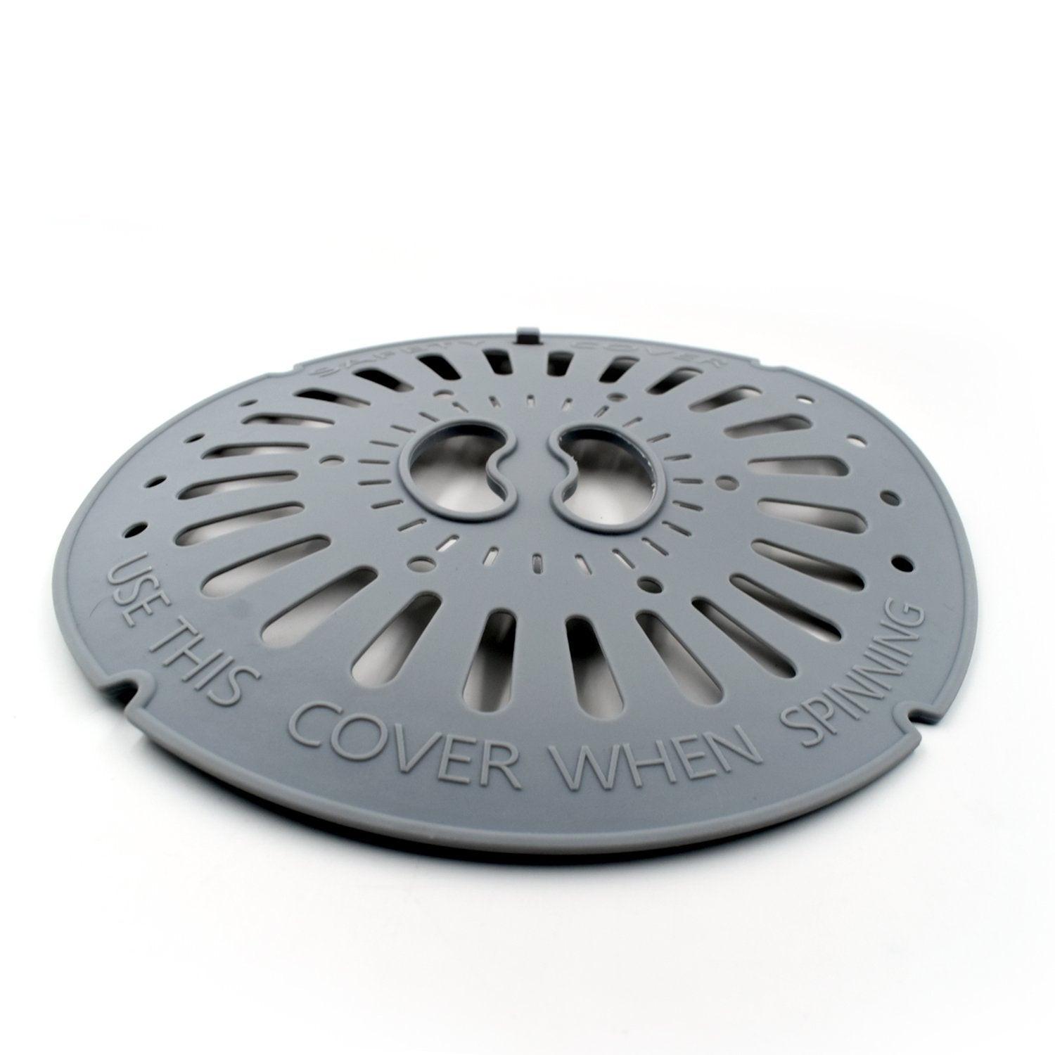 Spin cap safety cover in gray designed for secure and safe spinning use