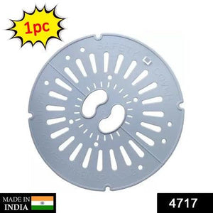 Spin cap safety cover in gray, designed to protect against spills and ensure safety in home kitchens