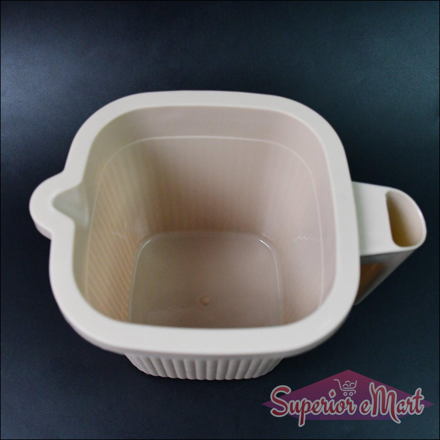 BPA free bath mug in beige with a handle for easy pouring and stylish use in the bathroom