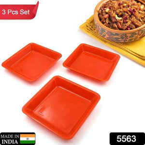 Square dinner plate set in bright orange color made from durable material, perfect for serving meals