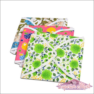 Set of three colorful square rotichapati covers with floral and fruit designs for kitchen use