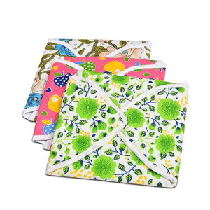 Set of three colorful square rotichapati covers with floral and fruit designs for kitchen use