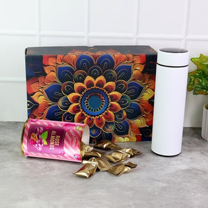 Stainless steel bottle and rose almonds gift set displayed with decorative packaging and almonds spilling out