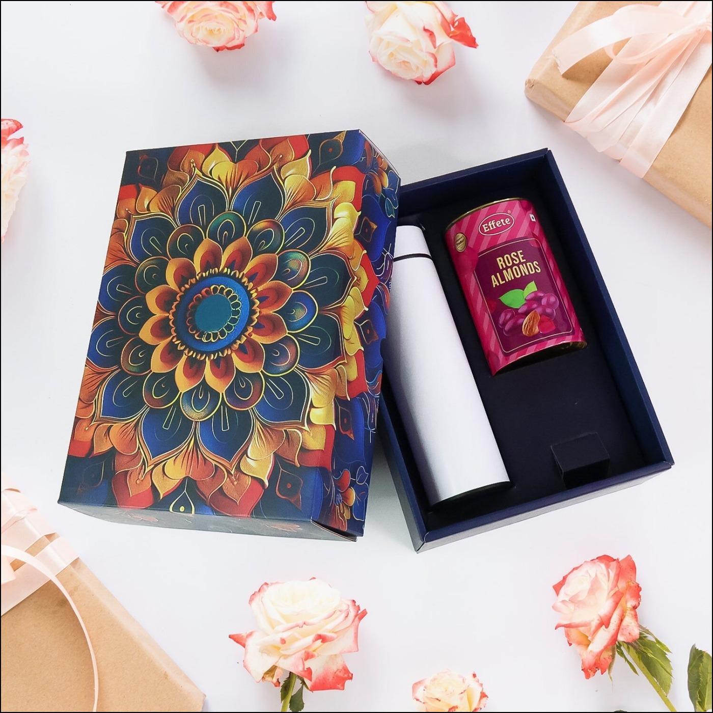 Stainless steel bottle and rose almonds gift set in a decorative box with floral design