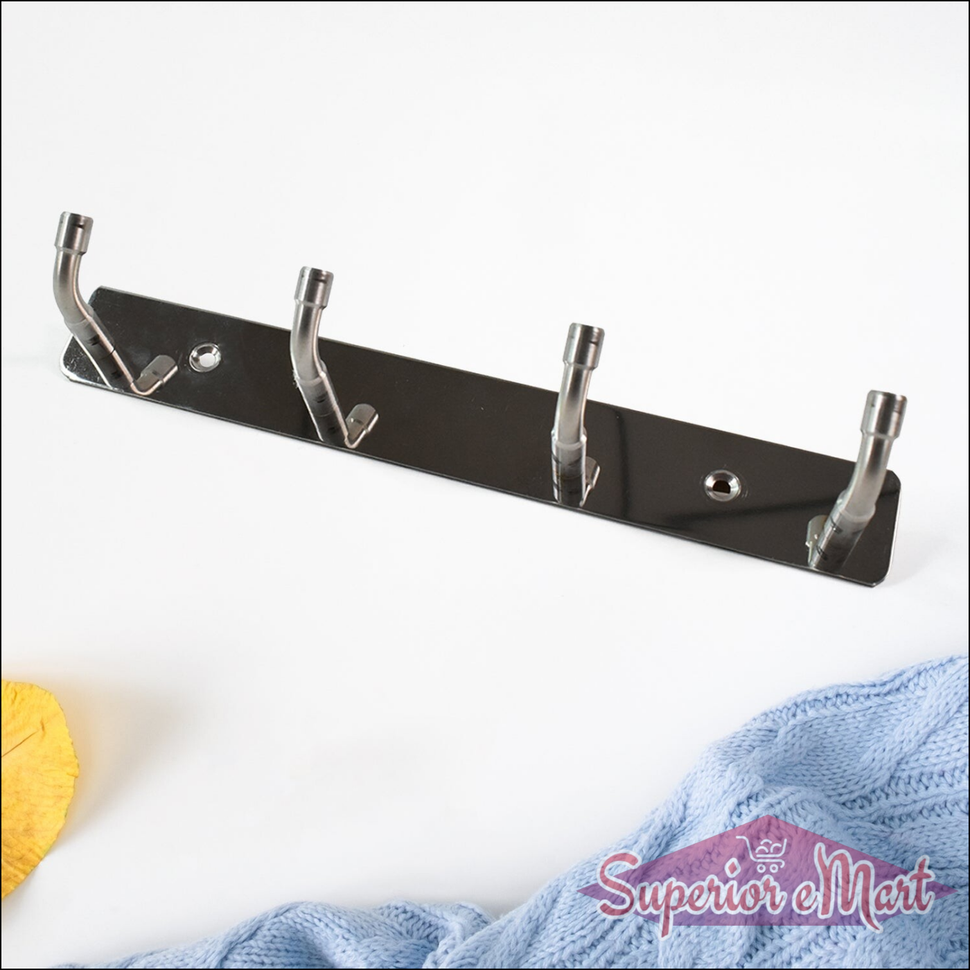 Stainless steel wall mounted coat rack with four hooks for stylish and organized entryways