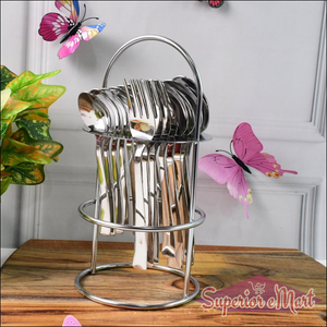 Elegant stainless steel cutlery set displayed in a stylish holder for dining and kitchen use