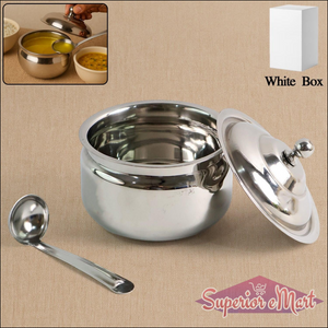 Stainless steel ghee pot with a lid and serving spoon, perfect for storing and serving ghee