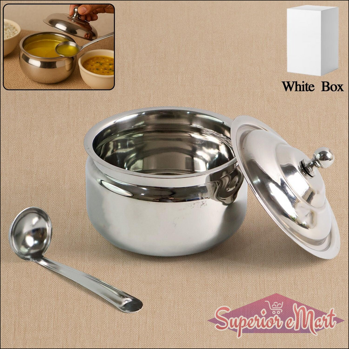 Stainless steel ghee pot with a lid and serving spoon, perfect for storing and serving ghee