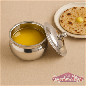 Superior eMart stainless steel ghee pot with lid alongside a traditional Indian flatbread