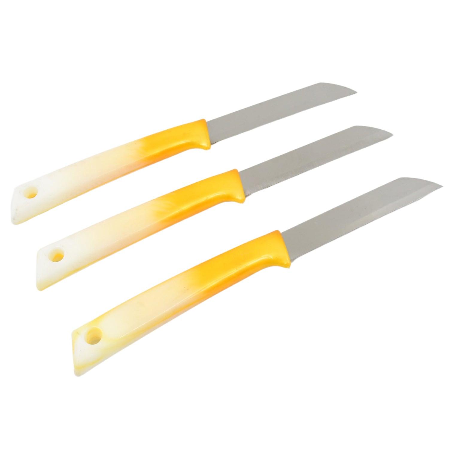 Set of three stainless steel kitchen knives with ergonomic yellow handles for easy slicing