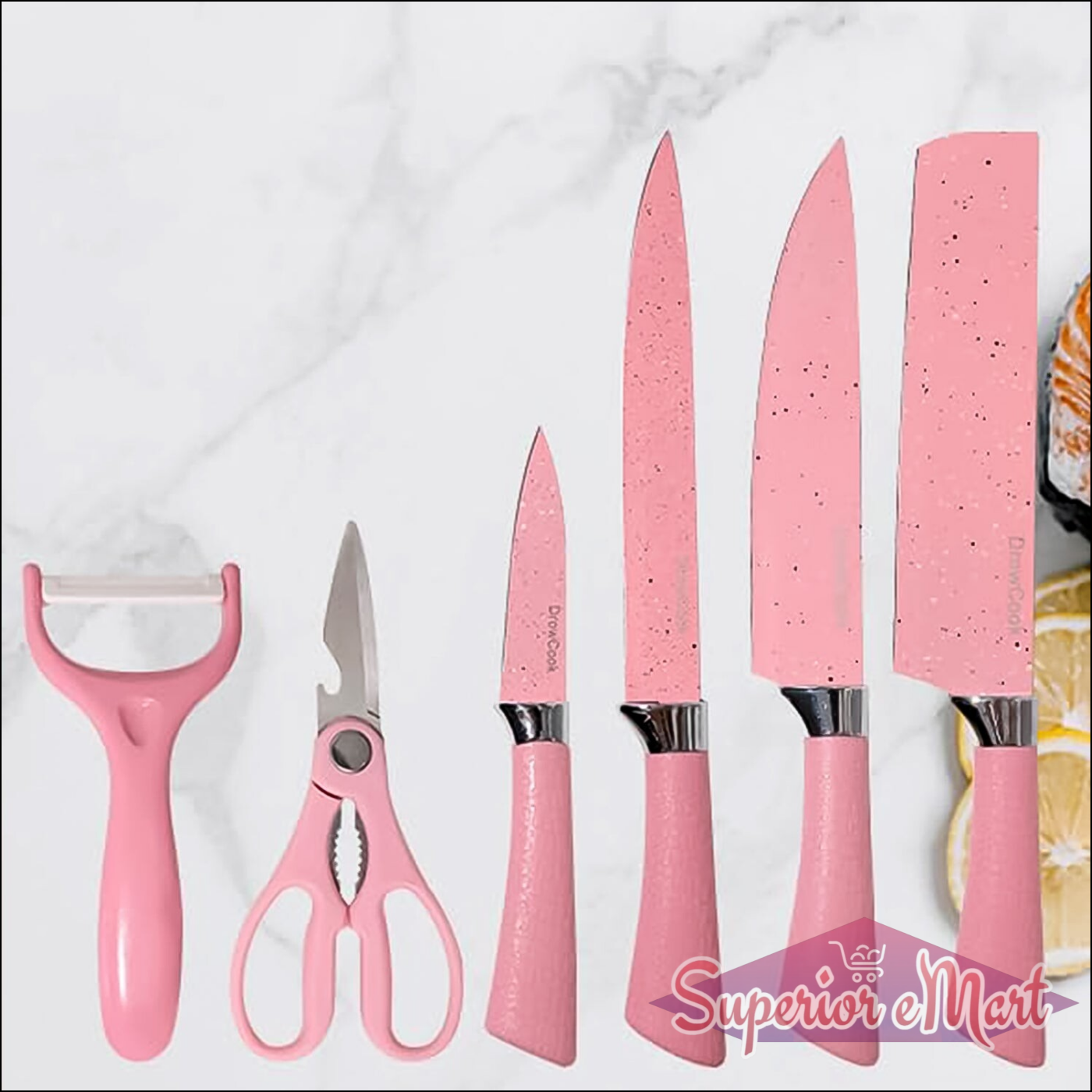 Stainless steel ceramic knife set in pink, including peeler, scissors, and various knives for kitchen use