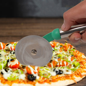 Stainless steel pizza cutter slicing a freshly baked pizza with various toppings