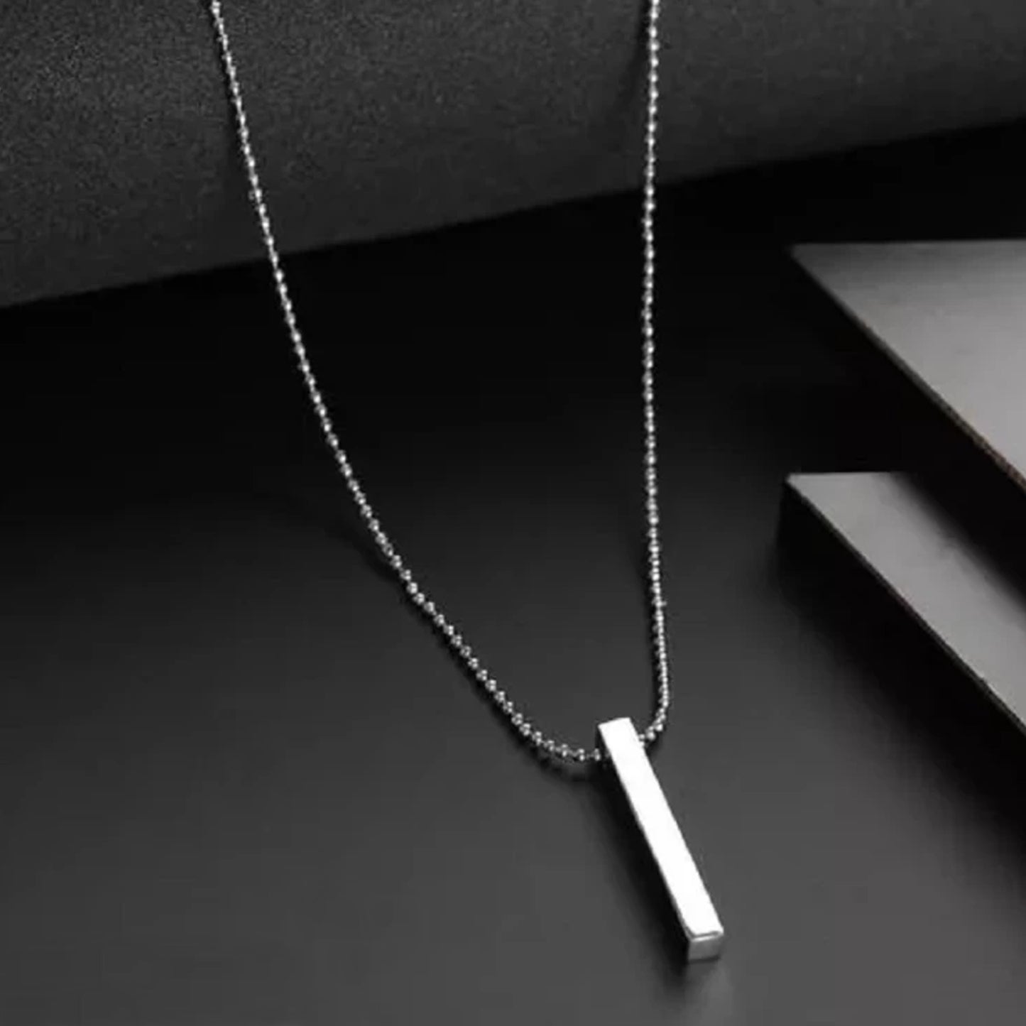 Superior eMart stainless steel stick necklace with a sleek minimalist design and elegant pendant