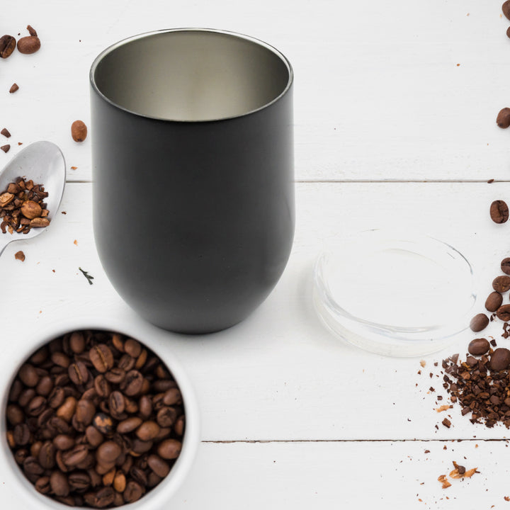 Sleek black stainless steel travel mug with a lid perfect for coffee on the go
