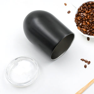 Black stainless steel travel mug with a sleek design, perfect for coffee lovers on the go