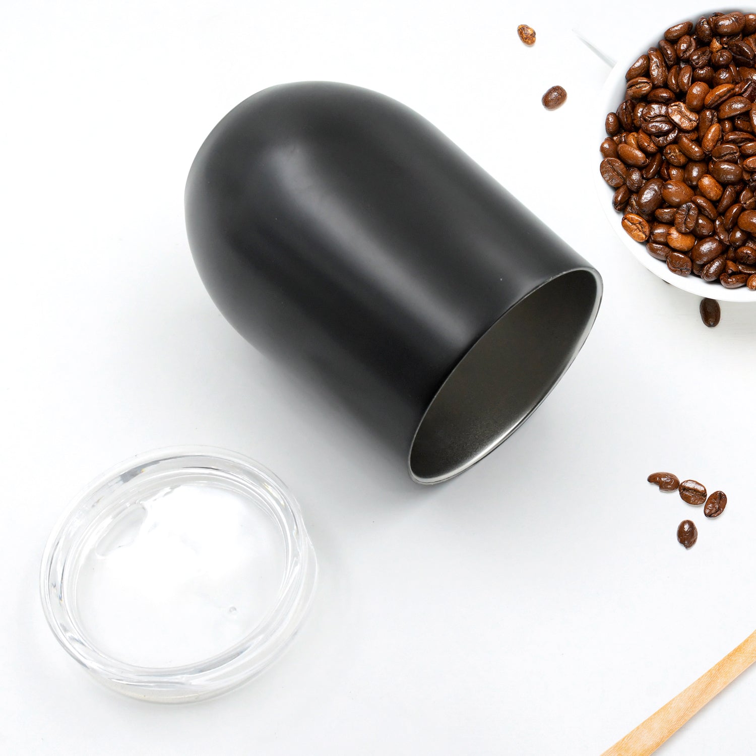 Black stainless steel travel mug with a sleek design, perfect for coffee lovers on the go