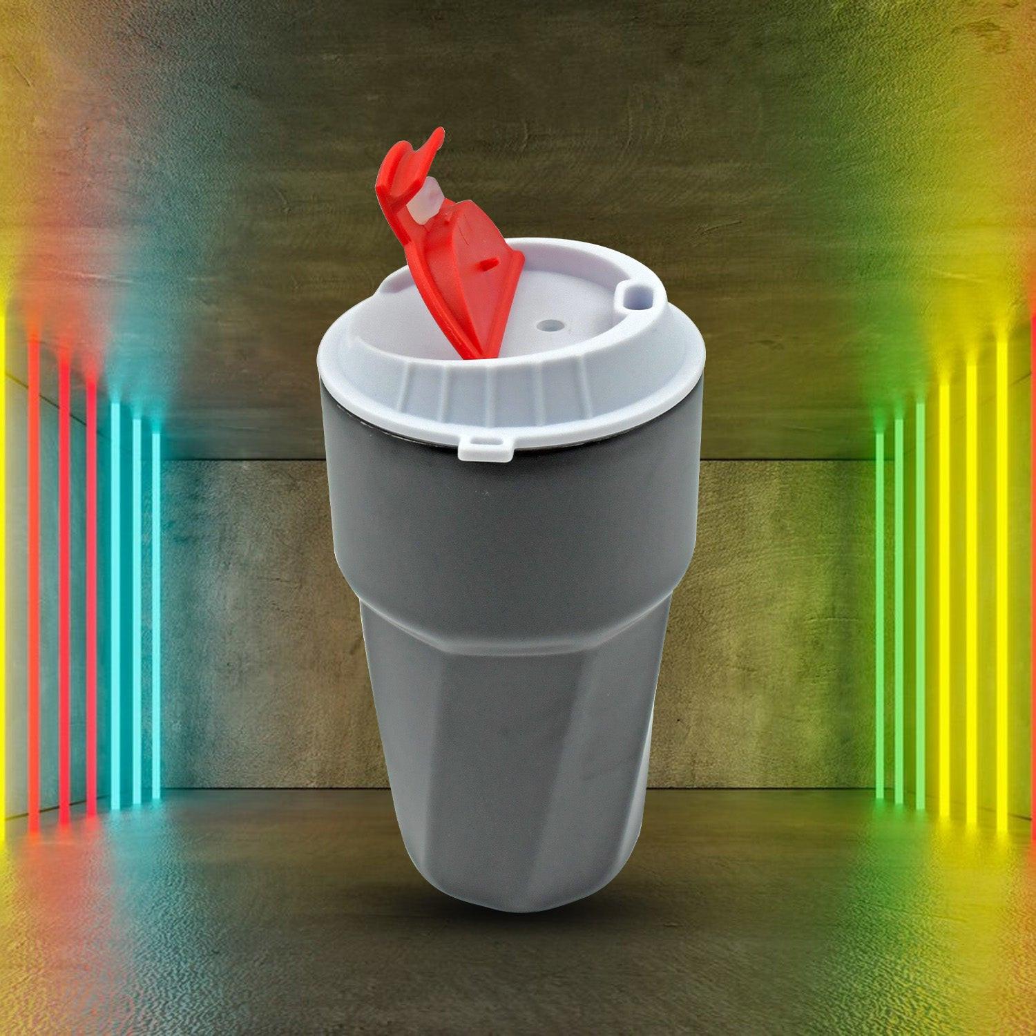 Stainless steel travel mug with a secure lid and vibrant red cap for on-the-go beverages