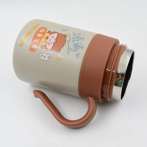 Cute stainless steel vacuum insulated mug with handle and playful design for beverages on the go