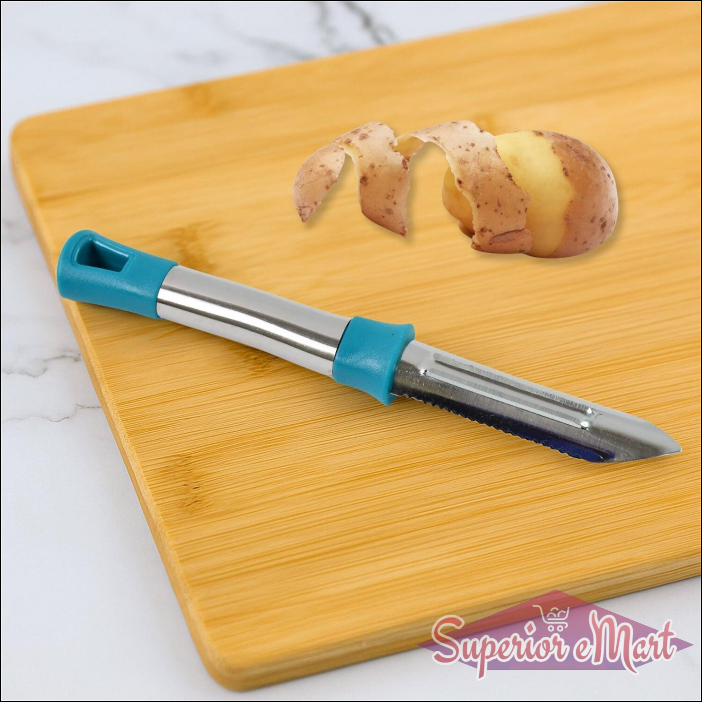 Superior eMart stainless steel vegetable peeler with ergonomic handle for easy peeling on bamboo board