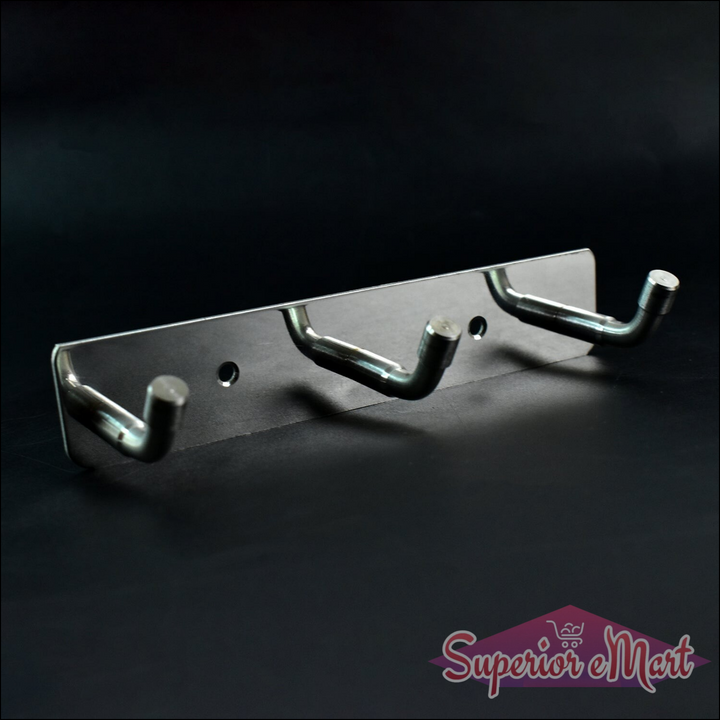 Stainless steel wall mounted coat rack with three sturdy hooks for organizing coats and accessories