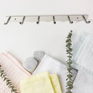 Stainless steel wall mounted coat rack with five hooks, perfect for organizing towels and coats