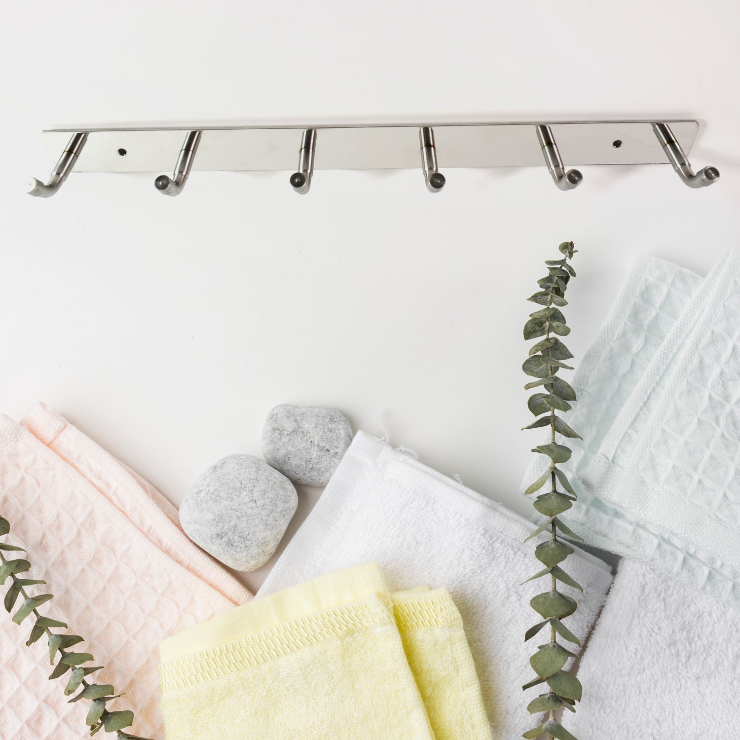 Stainless steel wall mounted coat rack with five hooks, perfect for organizing towels and coats