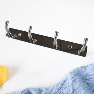 Stainless steel wall mounted coat rack with four hooks for stylish and organized entryways