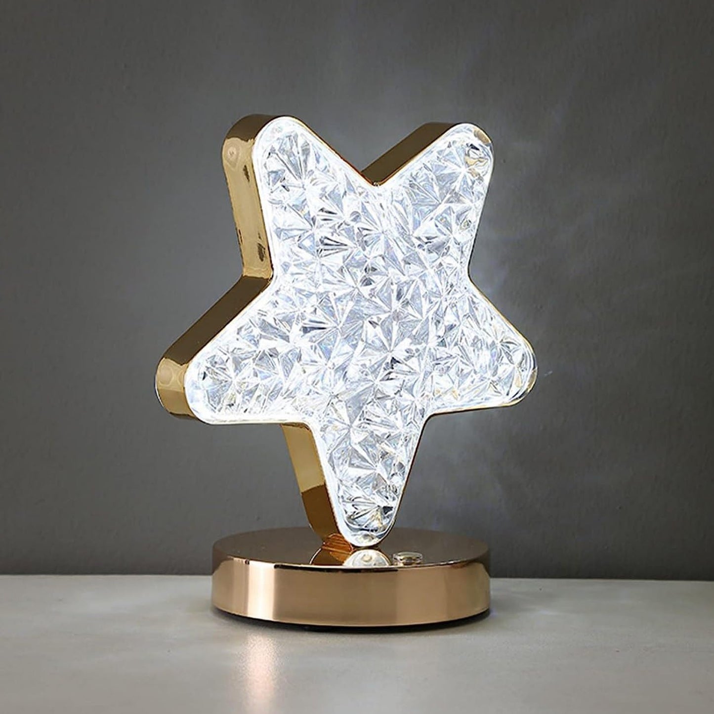 Star shape crystal lamp with a shiny gold base, perfect for adding elegance to home decor