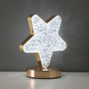 Star shape crystal lamp with a shiny gold base, perfect for adding elegance to home decor