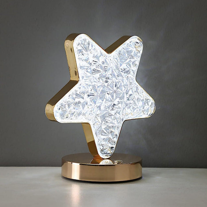 Star shape crystal lamp with a shiny gold base, perfect for adding elegance to home decor