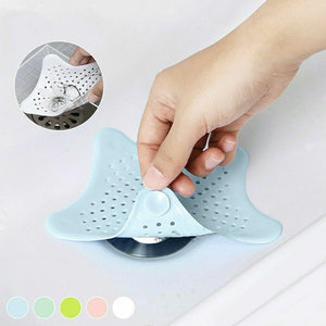 Light blue star shape sink strainer designed to catch food debris and prevent clogs in your kitchen sink