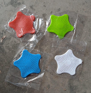 Colorful star shape sink strainer set in red, green, blue, and white for effective drainage