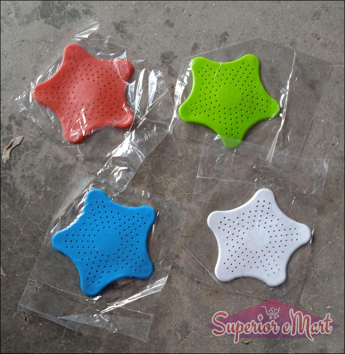 Colorful star shape sink strainer set in red, green, blue, and white for effective drainage