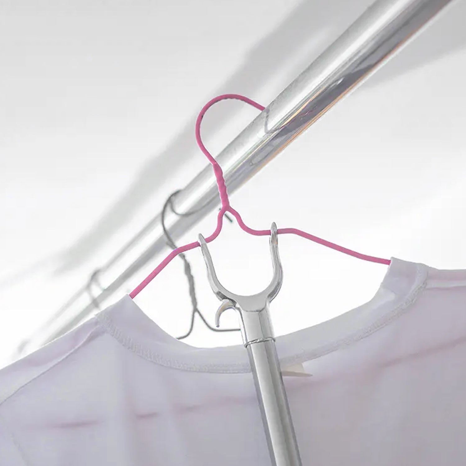 Steel telescopic hanger tool with adjustable grip for easy clothing organization