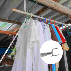 Steel telescopic hanger tool extending to reach clothes on hangers in outdoor setting